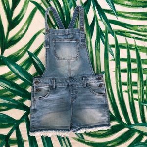 Faded denim overalls